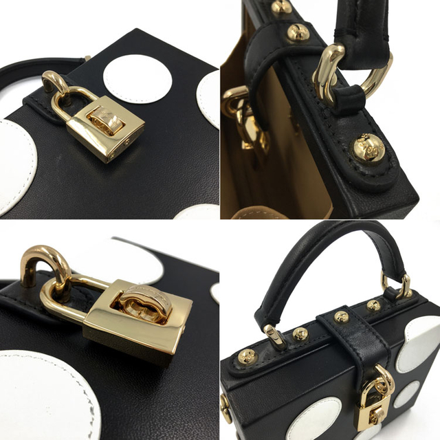 Упаковка складных отелей ткани ванной комнаты и одно металлическая черная с белой кожаной кожа