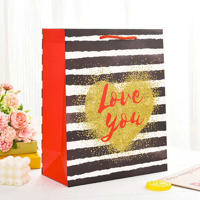 Роскошные бренды на заказ логотип подарочный бумажный пакет для одежды розовый матовая одежда для одежды для одежды.